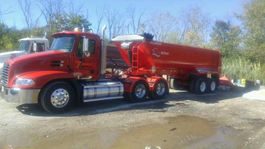 Red Trim's Trucking tractor and dump trailer